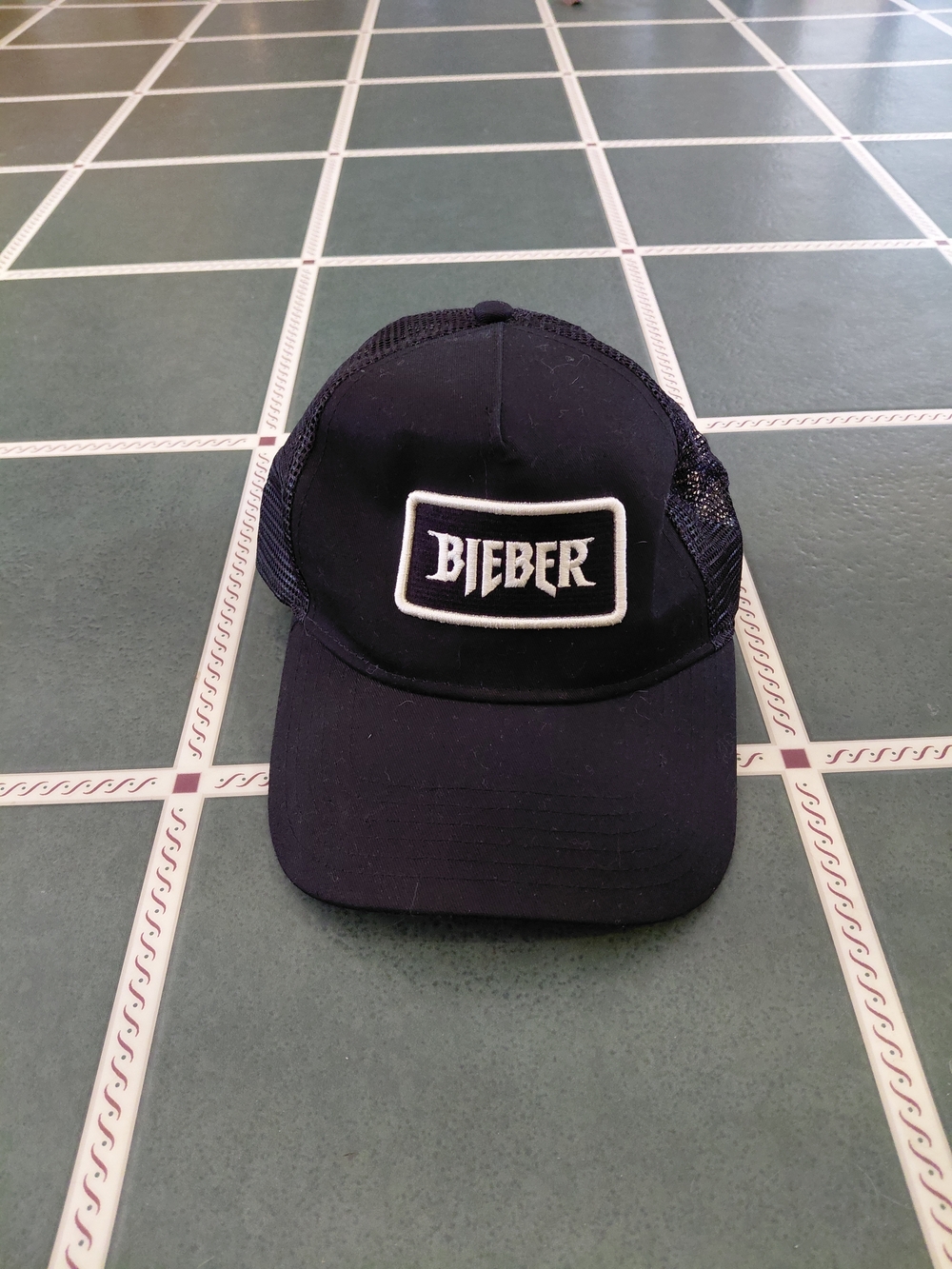 Bieber Black Trucker Hat with Embroidered Patch